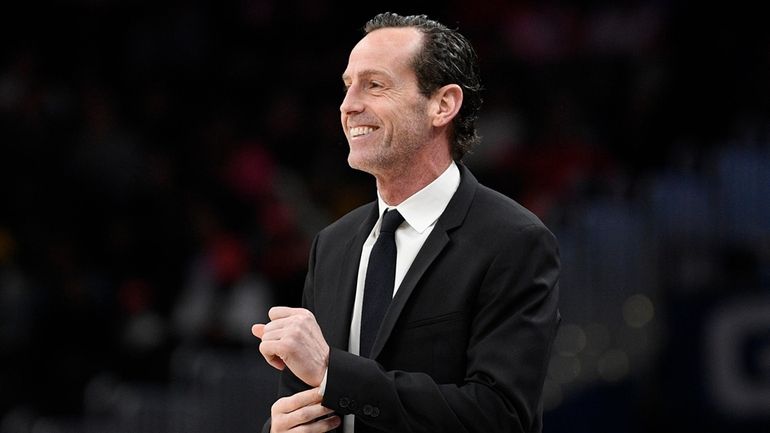 FILE - Brooklyn Nets coach Kenny Atkinson watches during the...