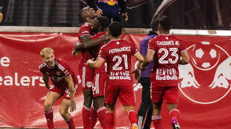 New York Red Bulls players celebrate after a goal against...