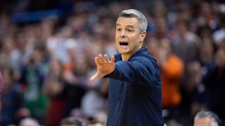 Virginia head coach Tony Bennett yells to his players during...