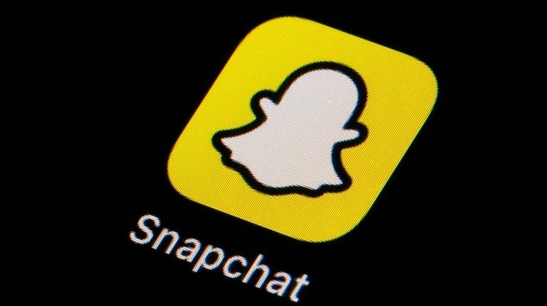 The icon for Snapchat is seen on a smartphone, Feb....