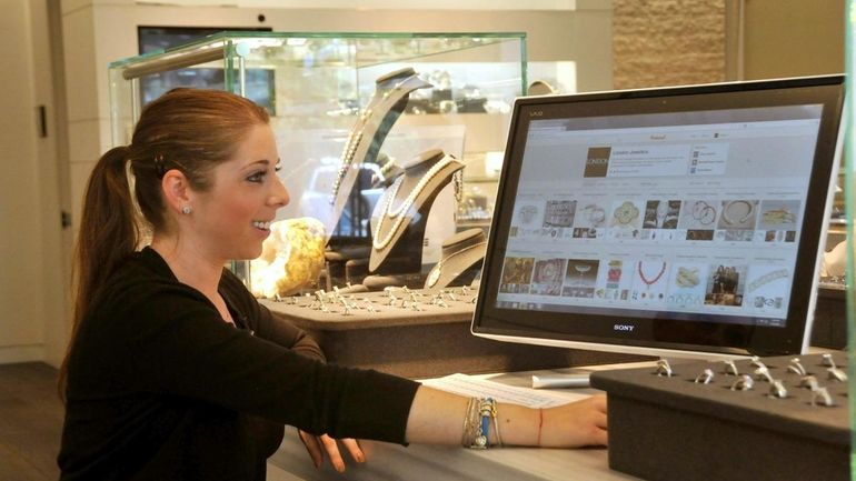 Paige Chernick, social media coordinator at London Jewelers, uses Pinterest,...