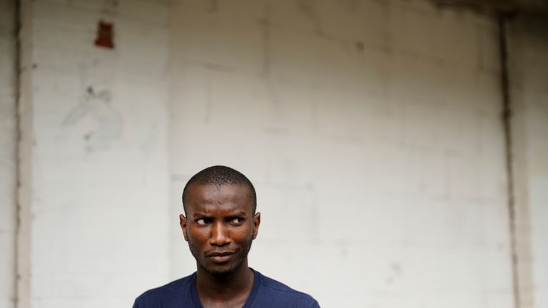 Omar Diallo, a 22-year-old migrant from Guinea in West Africa,...