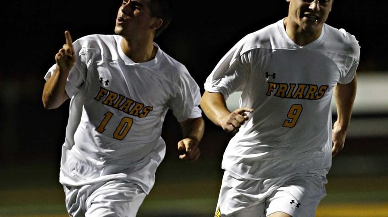 St. Anthony's TJ Butzke, left, and Michaelangelo Sini celebrate after...