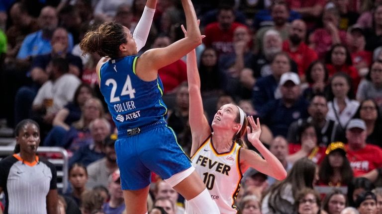 Minnesota Lynx forward Napheesa Collier (24) shoots over Indiana Fever...