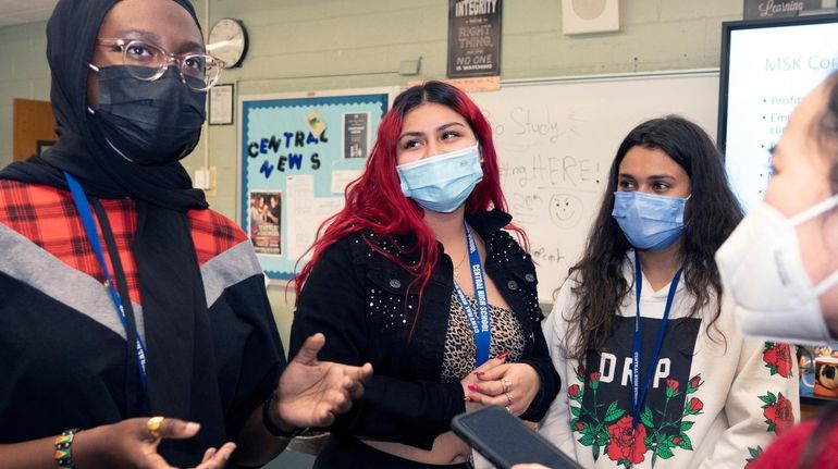 Valley Stream Central High School students Zakkiyya Fraser, 17 (left), Kayla...