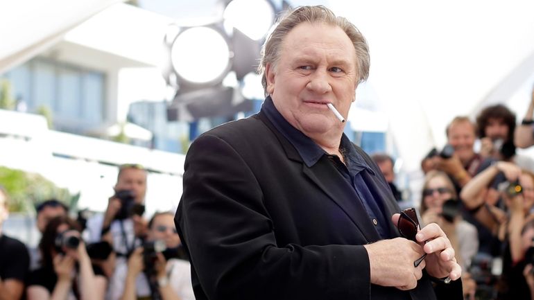 Actor Gerard Depardieu poses for photographers during a photo call...