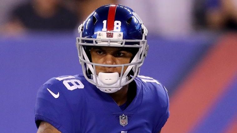 Roger Lewis Jr.#18 of the New York Giants celebrates the...