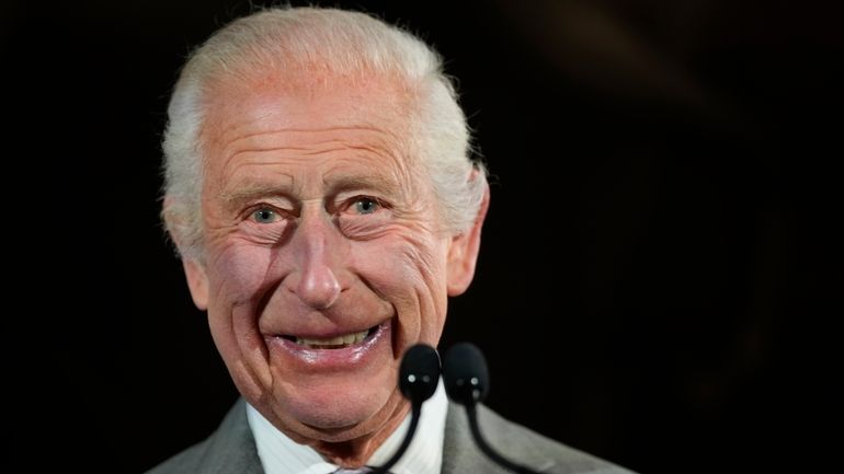 Britain's King Charles III smiles during his speech as he...