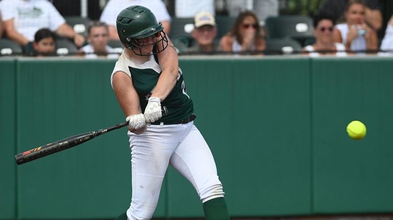 Katie Young #21 of Seaford connects for a three-run home...