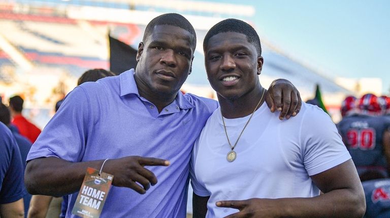 BOCA RATON, FLORIDA - NOVEMBER 30: Frank Gore and Devin...