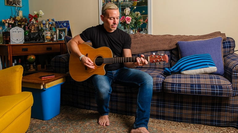 Musician Joe Anastasi in his Carle Place home. 