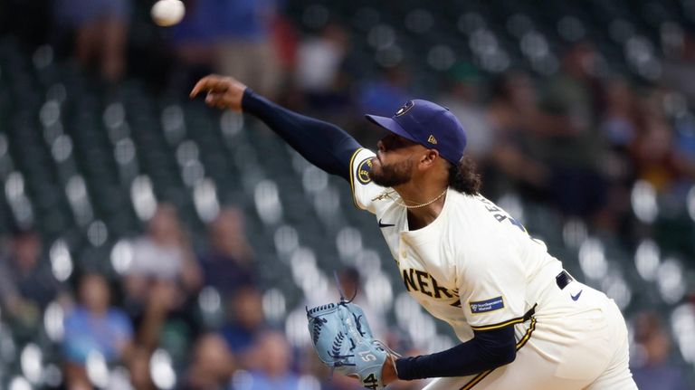 Milwaukee Brewers pitcher Freddy Peralta (51) throws to the San...