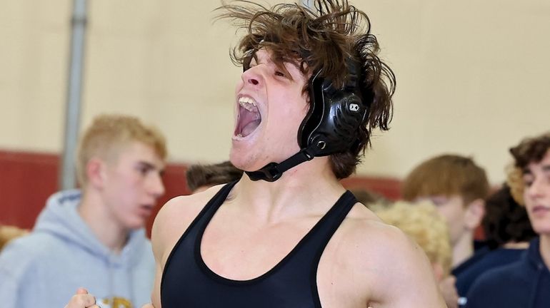 Glenn's Carmine Gerbino Jr. reacts after pinning Shoreham-Wading River's Wes...