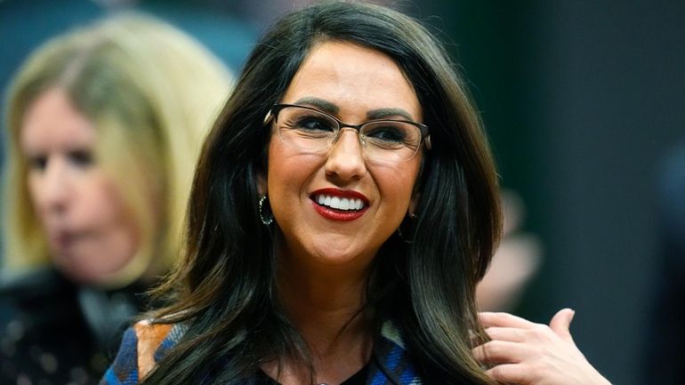 U.S. Rep. Lauren Boebert, R-Colo., greets well-wishers before the first...