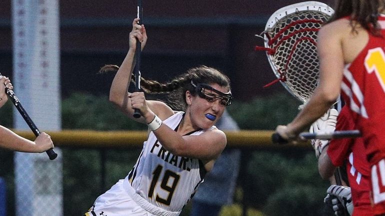 Katherine DeSimone of St. Anthony's leans in for the shot...