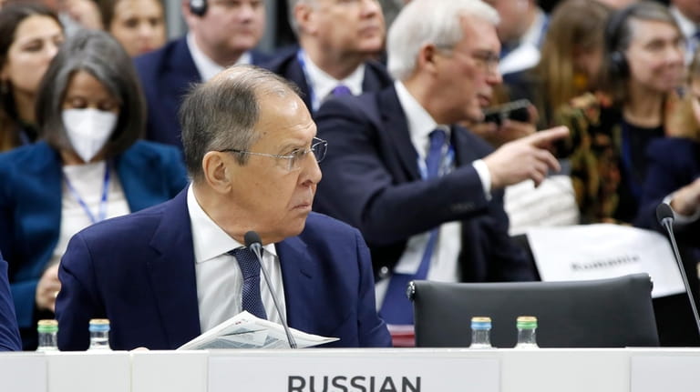 Russia's Foreign Minister Sergey Lavrov, front, attends the plenary session...