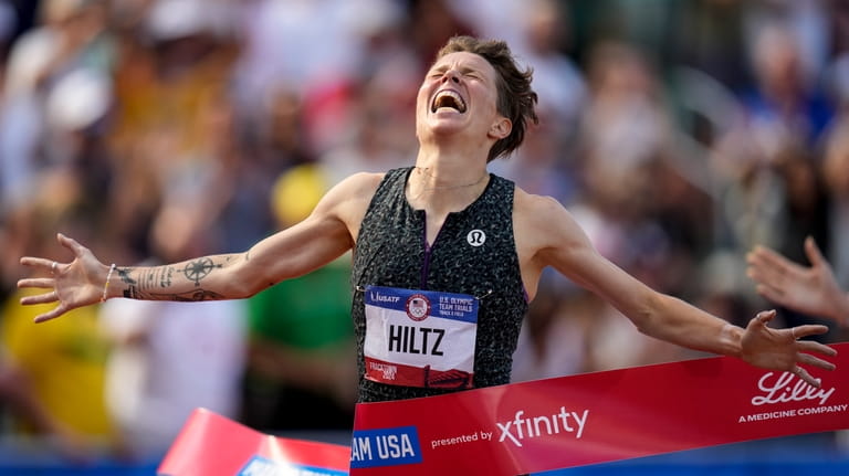 Nikki Hiltz celebrates after winning the women's 1500-meter final during...