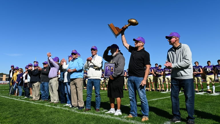 Members of Sayville's 1972 Suffolk Large School Champion team were on...