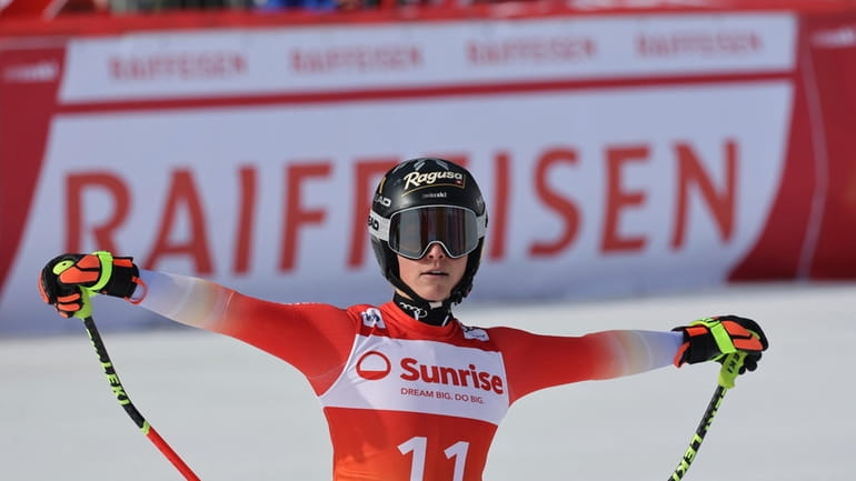 Switzerland's Lara Gut Behrami reacts after completing an alpine ski,...
