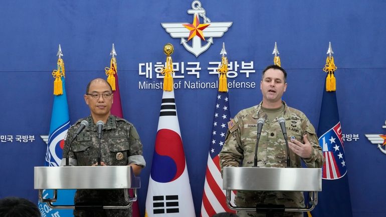 Col. Ryan Donald, right, CFC/UNC/USFK Public Affairs Director, and Col....