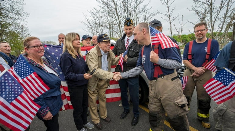 Members of the Southold Fire Department and American Legion Post...