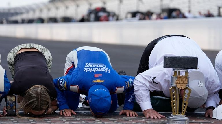 From left to right, Katelyn Larson, Kyle Larson and Rick...