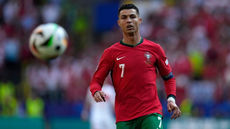 Portugal's Cristiano Ronaldo looks the ball during a Group F...