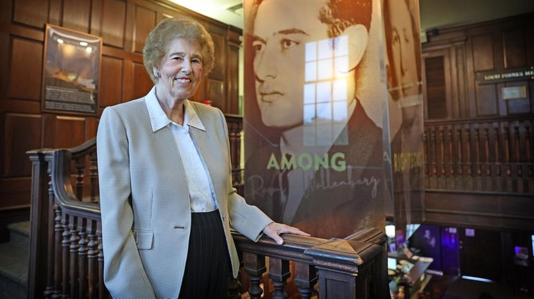 Agota Adler, 88, of Great Neck, in front of the newly...