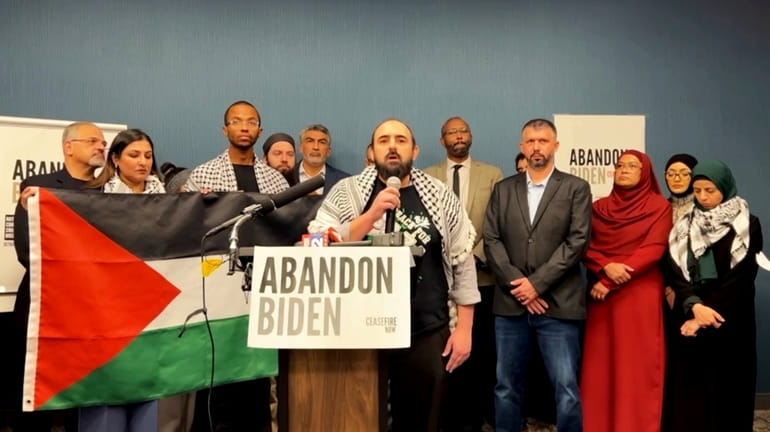 In this image taken from video, Muslim community leaders from...