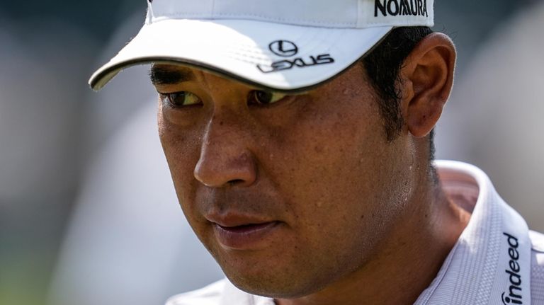 Hideki Matsuyama, of Japan, walks to the 10th tee during...