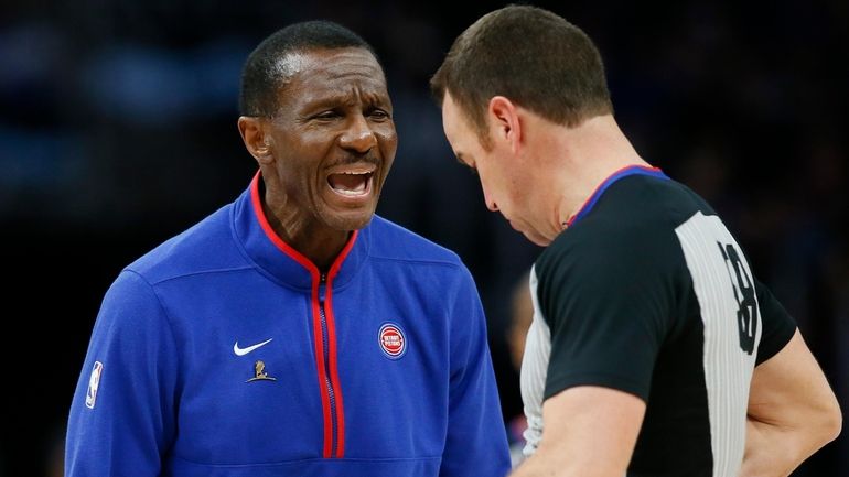 Detroit Pistons head coach Dwane Casey argues with referee Josh...