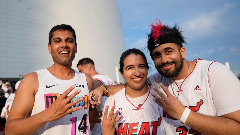 Rishabh Goel, left, and siblings Karishma, center, and Sid Chadha,...