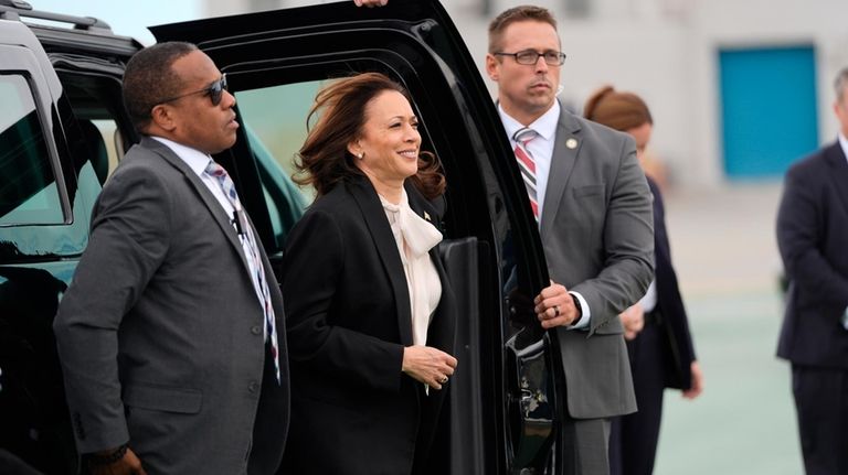 Democratic presidential nominee Vice President Kamala Harris, center, arrives to...