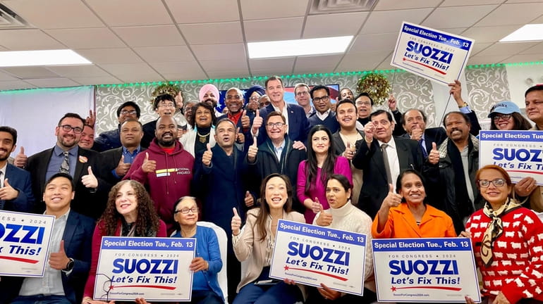 Tom Suozzi with members of the Asian and South Asian...