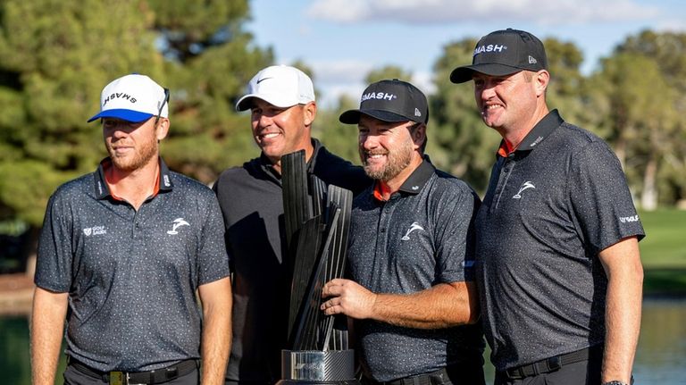 First-place team champions Captain Brooks Koepka, of Smash GC, Jason...