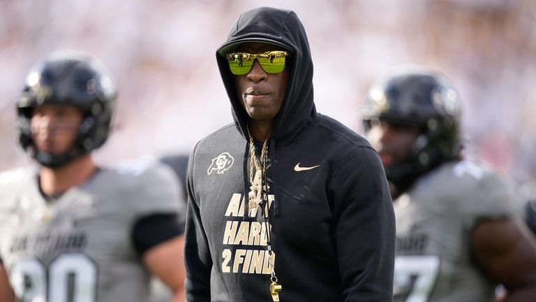 Colorado head coach Deion Sanders heads into the lockerroom after...