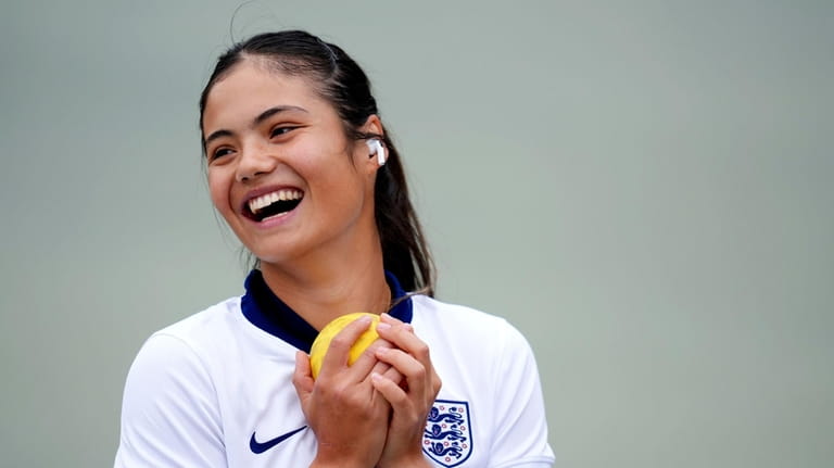 Britain's Emma Raducanu wearing an England football shirt, during a...