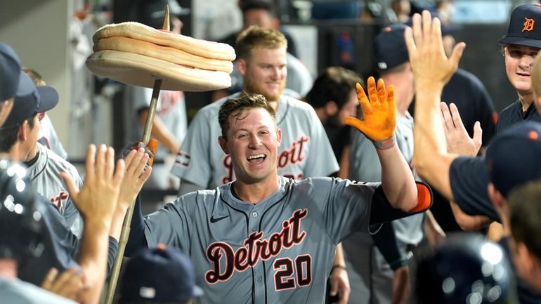 Detroit Tigers' Spencer Torkelson celebrates his three-run home run off...