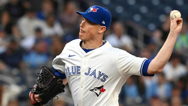 Toronto Blue Jays relief pitcher Ryan Yarbrough throws to a...