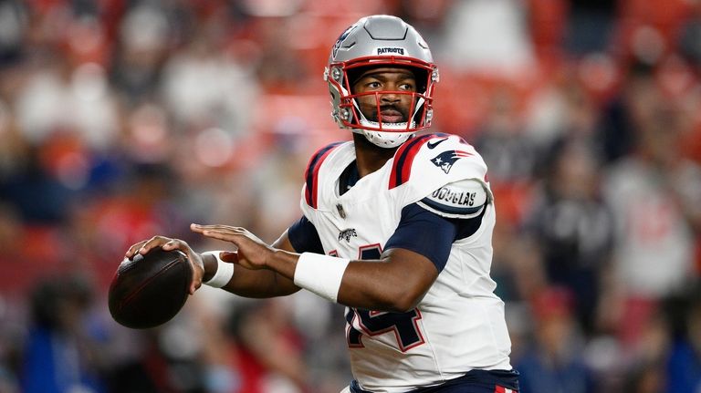 New England Patriots quarterback Jacoby Brissett passes against the Washington...