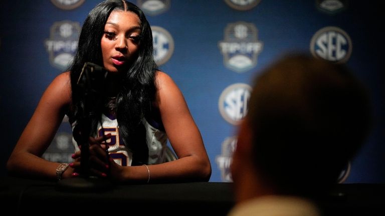 LSU NCAA women's college basketball player Angel Reese speaks during...