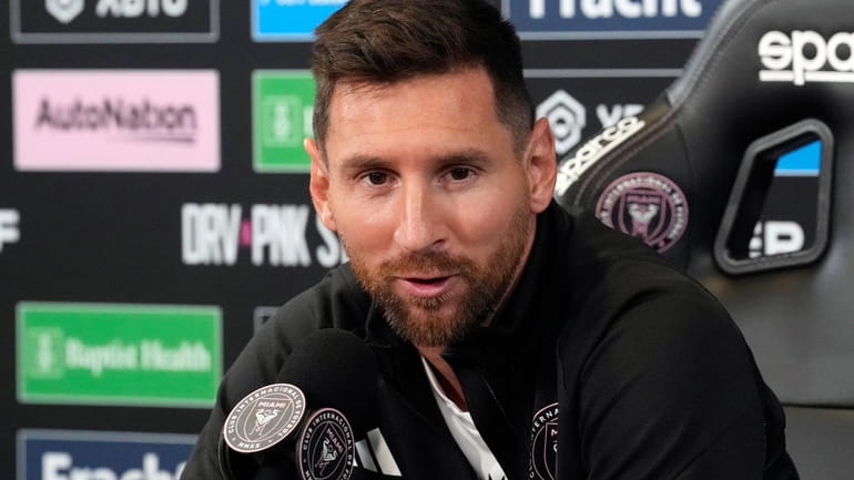 Inter Miami's Lionel Messi answers a question during a soccer...