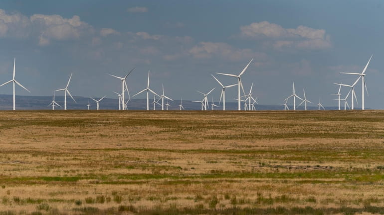 Wind turbines are seen from Interstate-84, July 9, 2023, near...