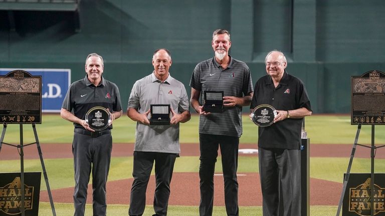 The Arizona Diamondbacks CEO Derrick Hall, left, and Managing General...