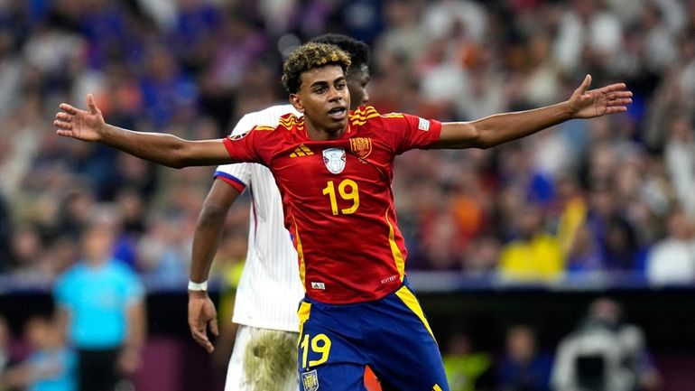 Spain's Lamine Yamal reacts during a semifinal match between Spain...