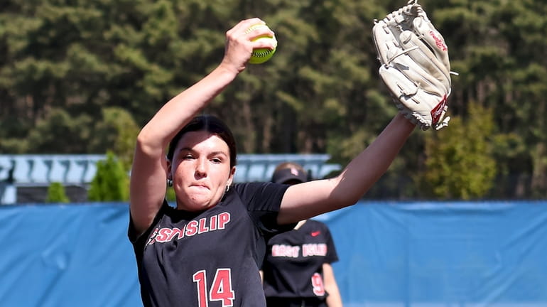 East Islip starting pitcher Caitlin Ropiak delivers a pitch against...