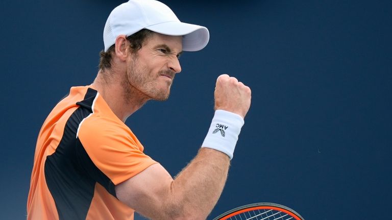 Andy Murray, of Great Britain, celebrates during his men's third...