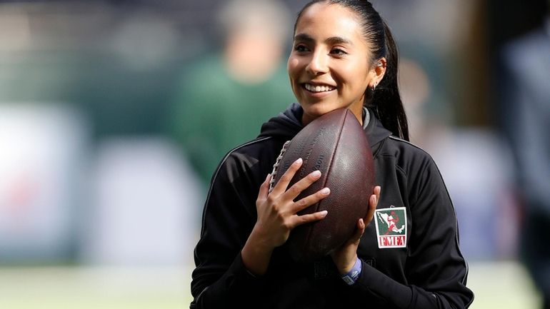 Team Mexico Women's Flag quarterback Diana Flores stands on the...