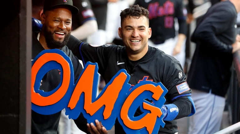 Jose Iglesias of the Mets celebrates his second-inning home run...