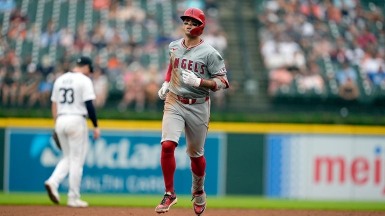 Los Angeles Angels' Zach Neto rounds the bases after a...